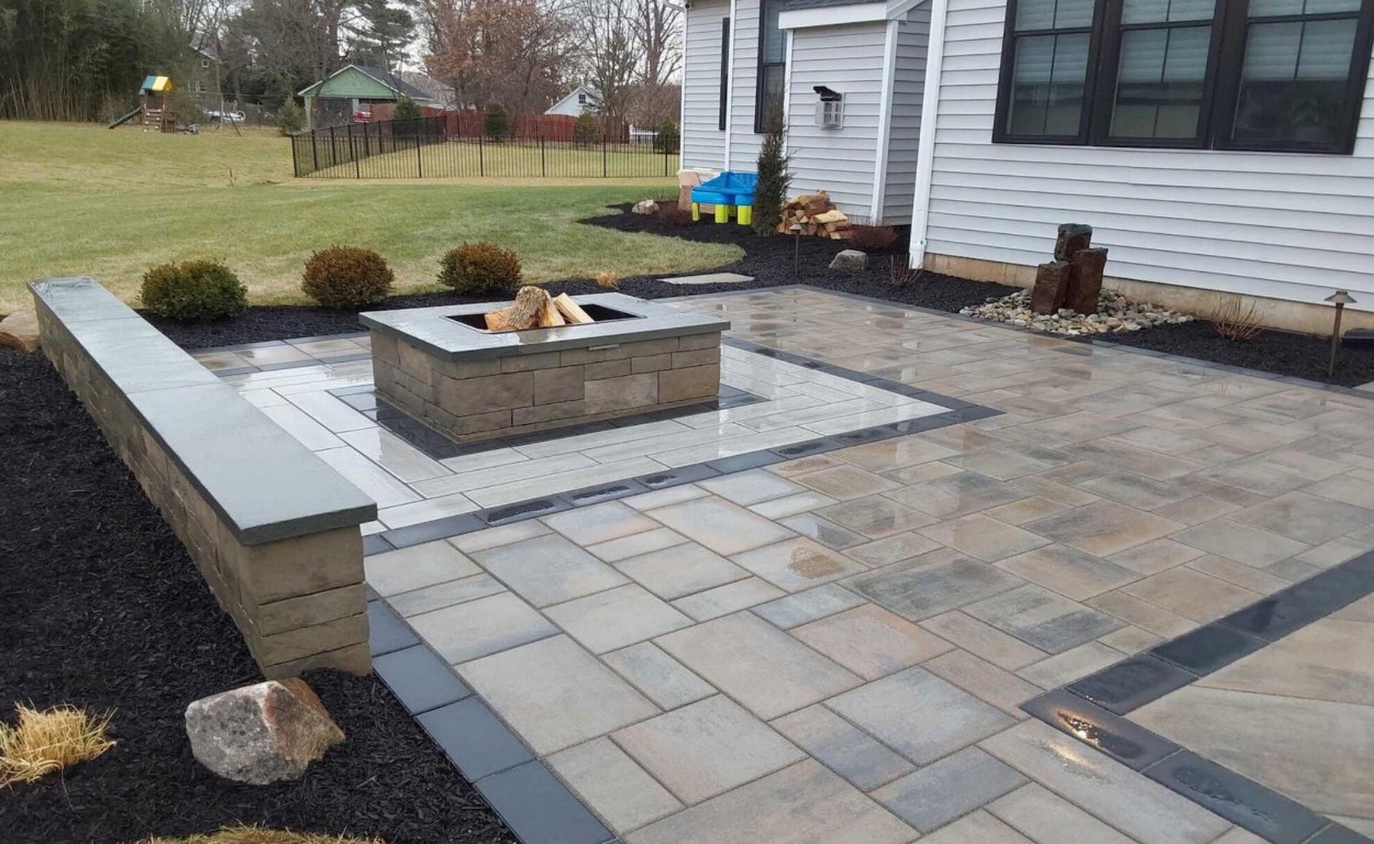 Decorative concrete patio with seating wall in Bowling Green, KY